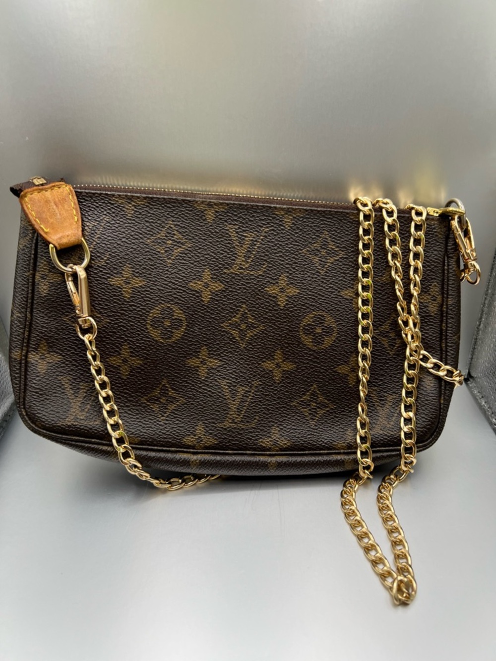 Louis Vuitton monogram pochette with unbranded chain